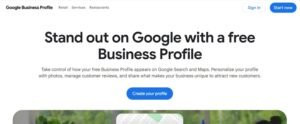 Google Business Profile homepage hero banner reading 'Stand out on Google with a free Business Profile' with subheadline on managing search visibility and customer reviews, alongside a Create your profile button.