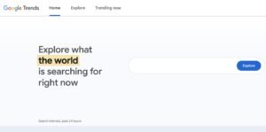Google Trends homepage hero section displaying the headline 'Explore what the world is searching for right now' with a yellow highlight and a rounded search bar with a blue 'Explore' button.