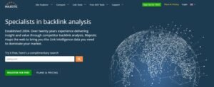 Majestic homepage hero section titled 'Specialists in backlink analysis' highlighting link intelligence data with a complimentary search bar and registration buttons.