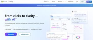 Microsoft Clarity homepage hero banner featuring the headline 'From clicks to clarity—with AI', product benefits, call-to-action buttons, and UI previews of behavioral analytics dashboards integrated with Microsoft Copilot.