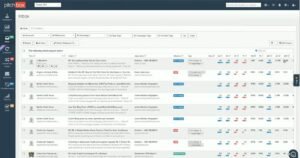 Screenshot of the Pitchbox collaborative unified inbox interface showing filtered conversation threads, automated milestone statuses, opportunity domains, SEO metrics, and contact tags