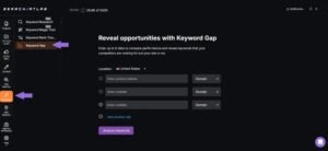 Search Atlas Keyword Gap analysis tool inside the dark-mode dashboard displaying input fields to compare a primary domain against competitor websites, set to the United States location with an Analyze Keywords button.