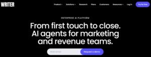 Writer homepage hero section on a black background titled 'From first touch to close. AI agents for marketing and revenue teams.' featuring a demo request email form and free trial button.