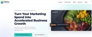 Modern full-service digital marketing hero section with the headline "Turn Your Marketing Spend Into Accelerated Business Growth" above supporting text emphasizing cross-channel performance strategies. The visual features an overhead shot of a vibrant salmon poke bowl overlaid with an e-commerce case study badge highlighting "305% Ecommerce revenue growth" for sustainable outdoor brand Nomadix, accompanied by CTAs for "BOOK A STRATEGY SESSION" and "SEE CLIENT RESULTS".